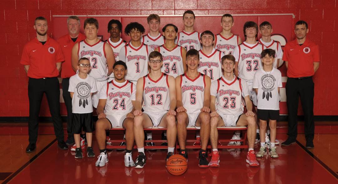 A group of boys basketball players posing for a photo

Description automatically generated